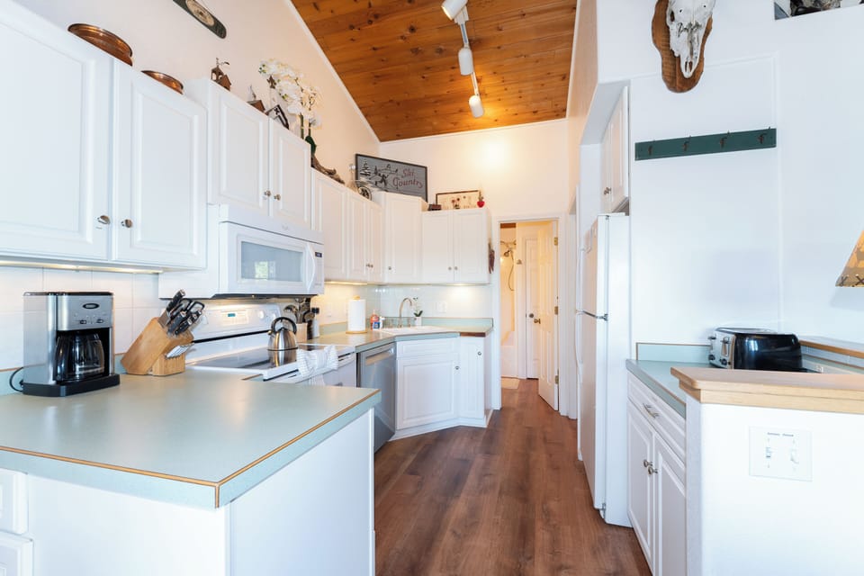 Ample counter space and cabinets for all your culinary creations | Upper Level