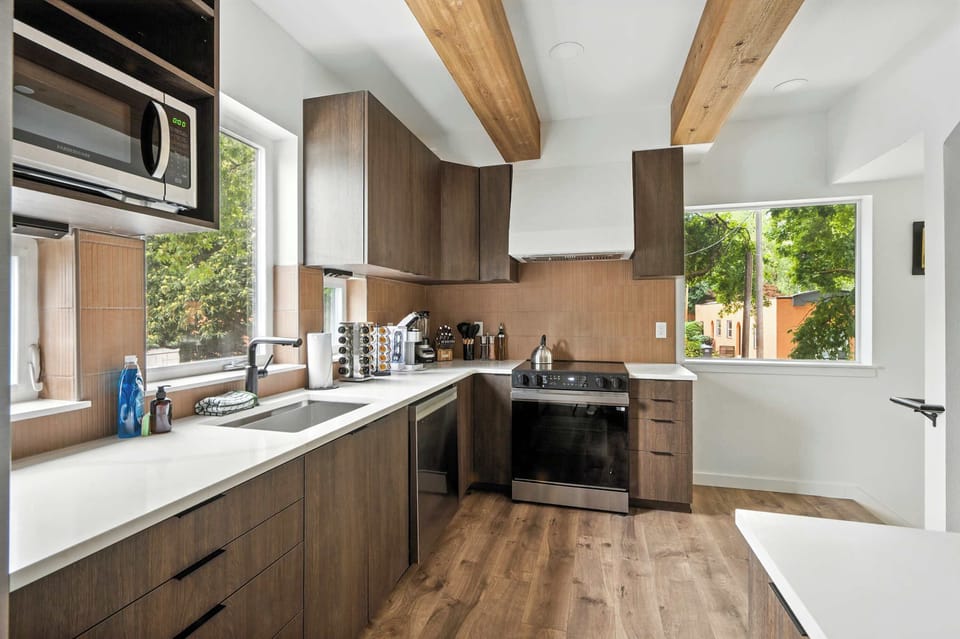 Kitchen with sink and range.