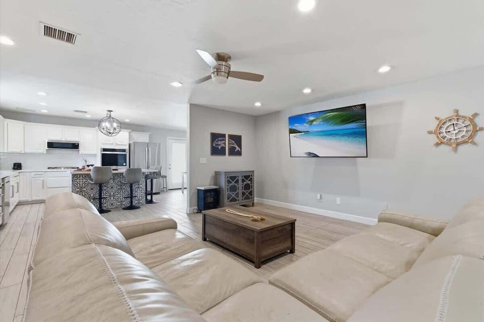 Open-concept living area featuring cozy furnishings and a Smart TV.