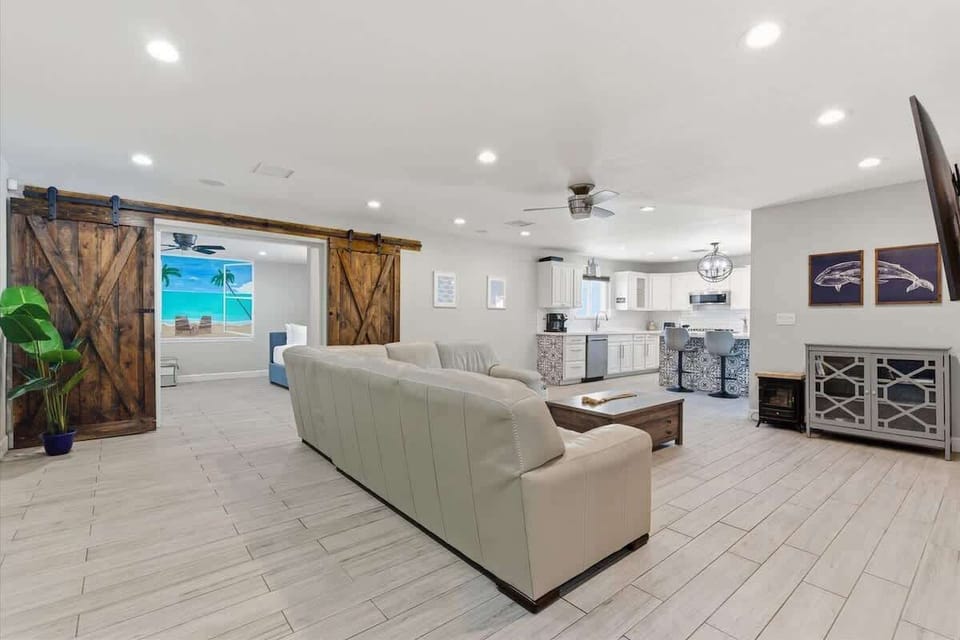 Open-concept living area featuring cozy furnishings and a Smart TV.