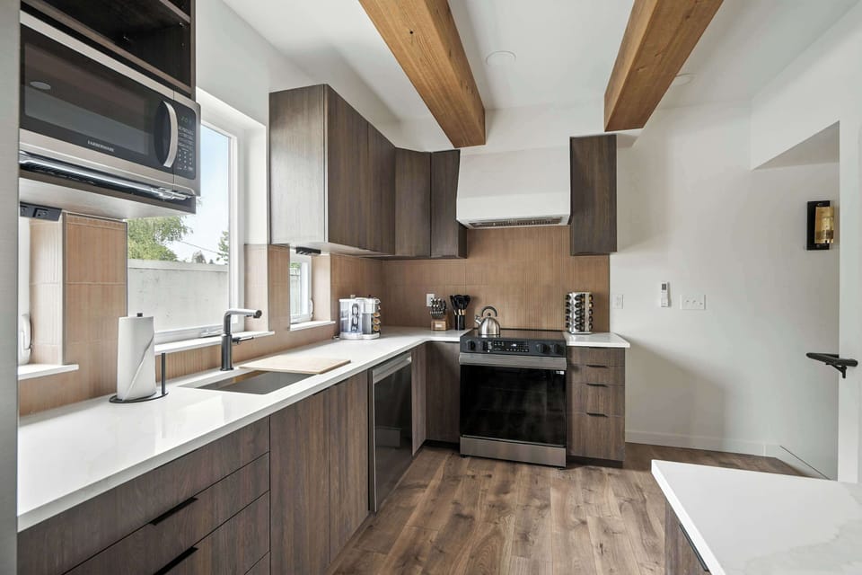 Kitchen with sink and range.