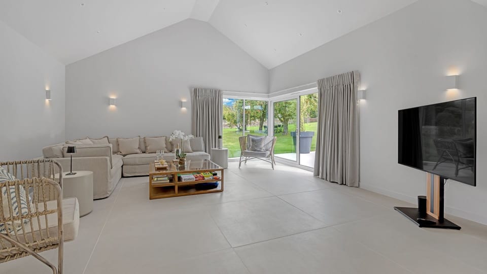 Generously sitting across one floor, the hub of the house is the impressive open plan living area.