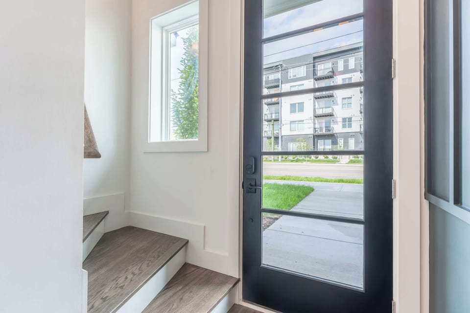 Step into modern luxury with this stunning entrance in one of Nashville's chic vacation homes. Perfect for friends and families alike, it's your gateway to unforgettable moments. Book now with Misfit Homes and make your Nashville getaway a reality!