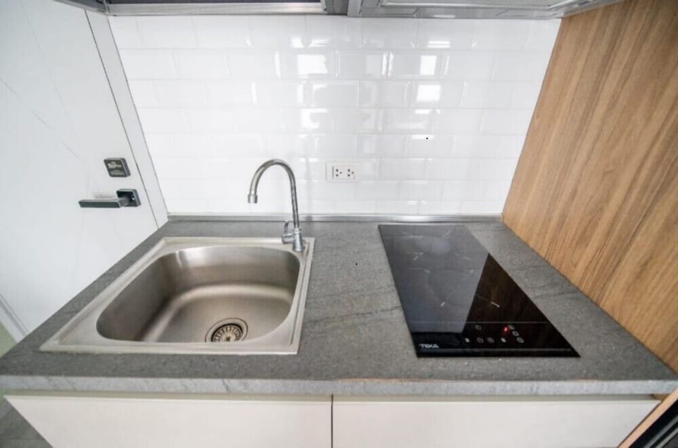 Apartment, Balcony, Hill View | Private kitchenette | Full-size fridge, microwave, stovetop, cookware/dishes/utensils