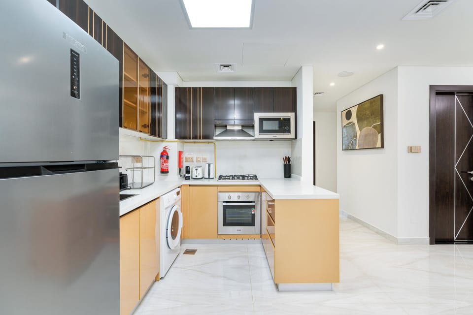 Signature Apartment, City View | Private kitchen | Fridge, microwave, oven, stovetop