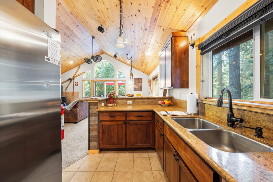 A fully stocked kitchen with reliable appliances and ample counter space for meal preparation.