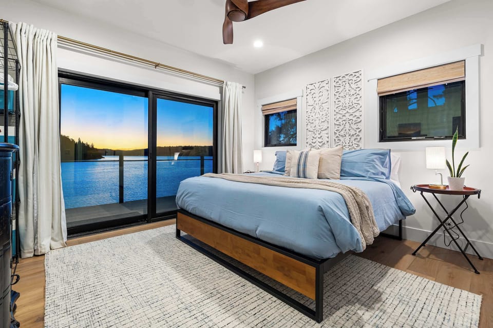 Drift to sleep with the lake just beyond your door — soft light, tranquil water, and the quiet rhythm of nature wrapping you in calm.