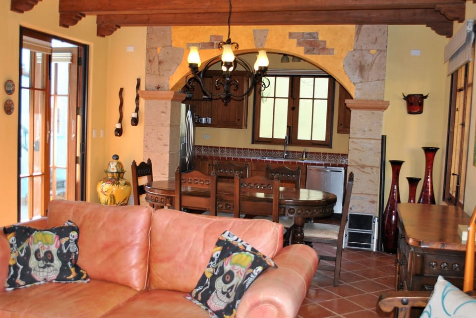 Living room and dinning room area. 
AC - Ceiling fan - Dinning table for 6