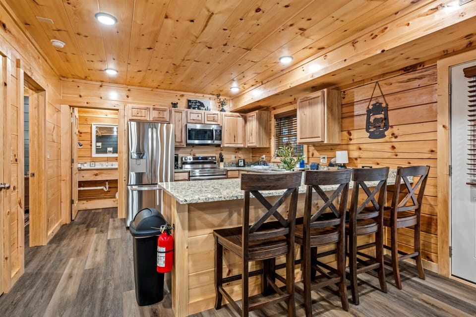 Easy place to prep meals, snack, or hang out around the island.