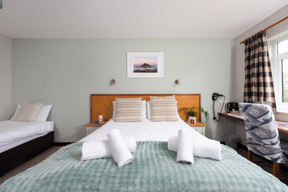 Family Quadruple Room, Private Bathroom, Ground Floor | Desk, laptop workspace, free WiFi