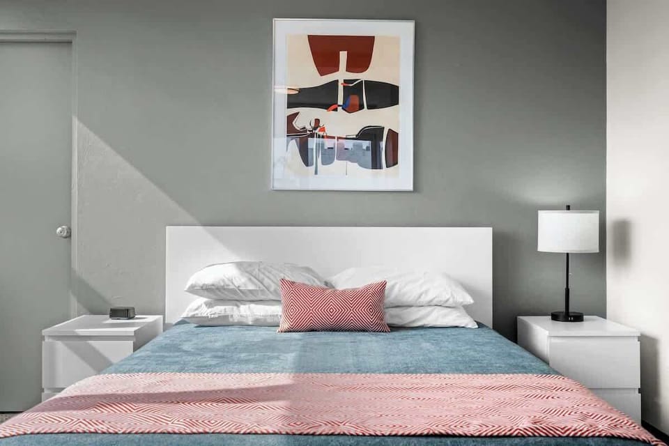 Step into a peaceful retreat designed for your ultimate relaxation. This comfortable bedroom provides a tranquil space for a restful night's sleep.