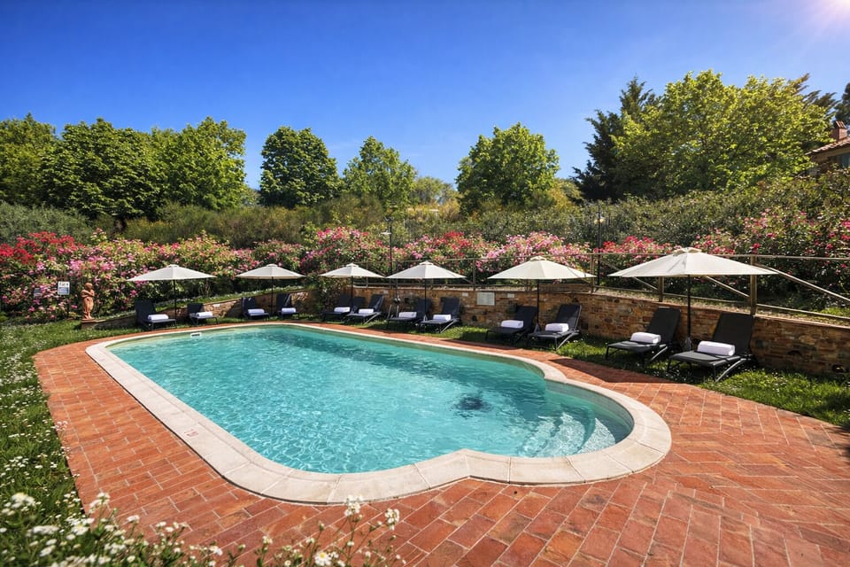 Seasonal outdoor pool, pool umbrellas, sun loungers