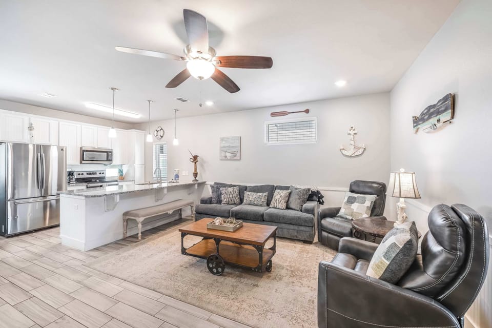 Meet the heart of the house. Our living room is all about big laughs, comfy naps, and the kind of downtime that makes vacations unforgettable.