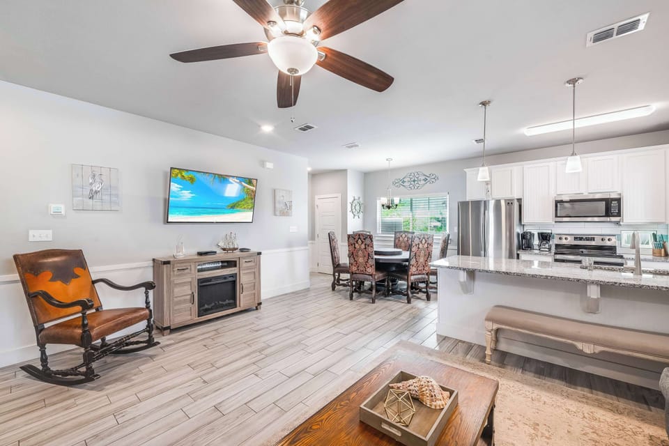 Flow from kitchen to couch to dining table without missing a single laugh. Our open-concept layout keeps everyone connected—and the good times rolling.
