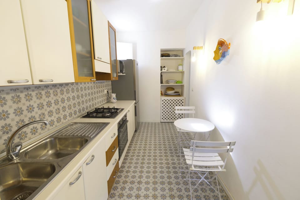 Villa, 3 Bedrooms, Balcony | Private kitchen | Fridge, microwave, oven, stovetop