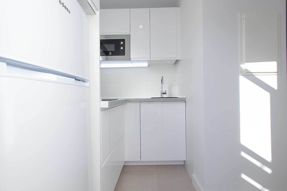 Comfort Apartment, Garden View | Private kitchen | Full-size fridge, microwave, stovetop, electric kettle