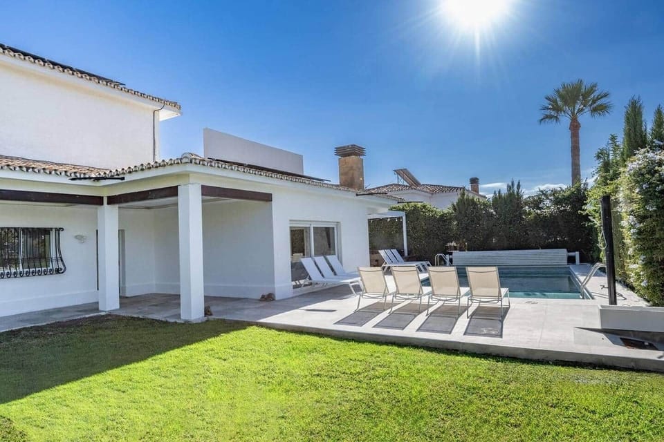 Spacious Villa with private HEATED pool, sun loungers and shaded outdoor seating. Designed for relaxation and style - enjoy sunny days, evening swims in lush warm water and tranquil views in complete privacy.
