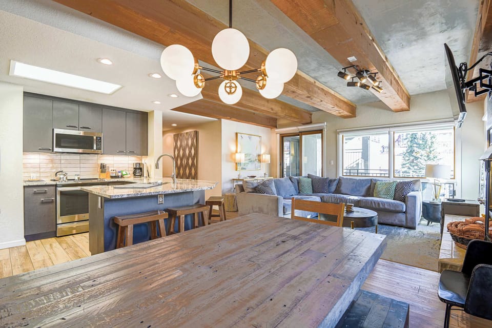 【Dining】Wood table for 6 under pendant lights — family dinners and board-game nights