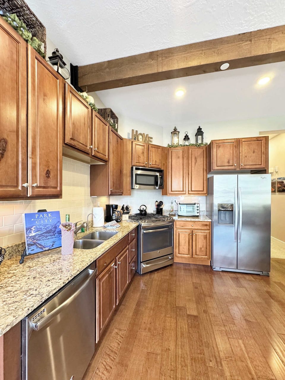 This kitchen feels like home with all the necessities you might need.