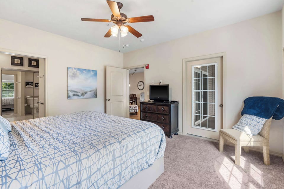The primary king suite boasts a smart TV, ensuite, & access to the balcony​