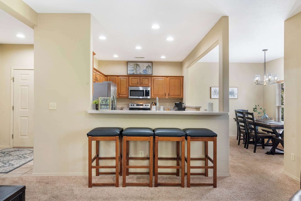 Sip morning coffee or grab a bite at the kitchen counter, seating 4​