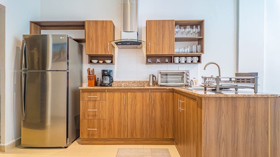 Condo, 2 Bedrooms | Private kitchen | Fridge, oven, coffee/tea maker, toaster