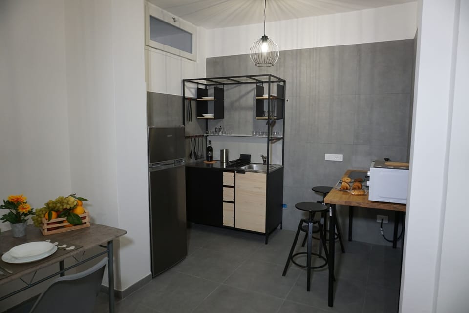 Standard Apartment, 1 Bedroom | Living area | Flat-screen TV