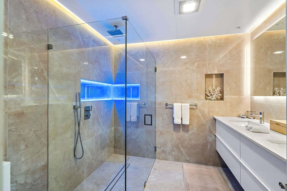 Guest bathroom has a large walkin shower