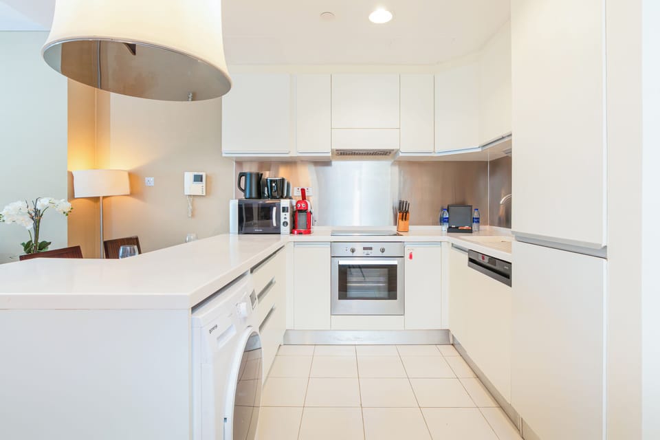 Luxury Apartment, Balcony, City View | Private kitchen | Full-size fridge, microwave, oven, stovetop
