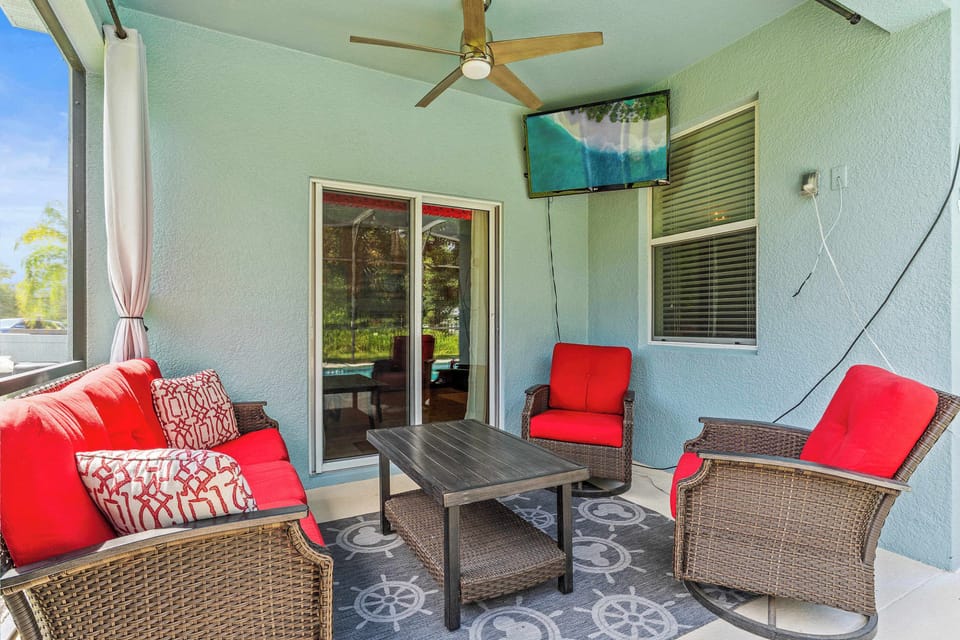 Private screened in pool with outdoor seating