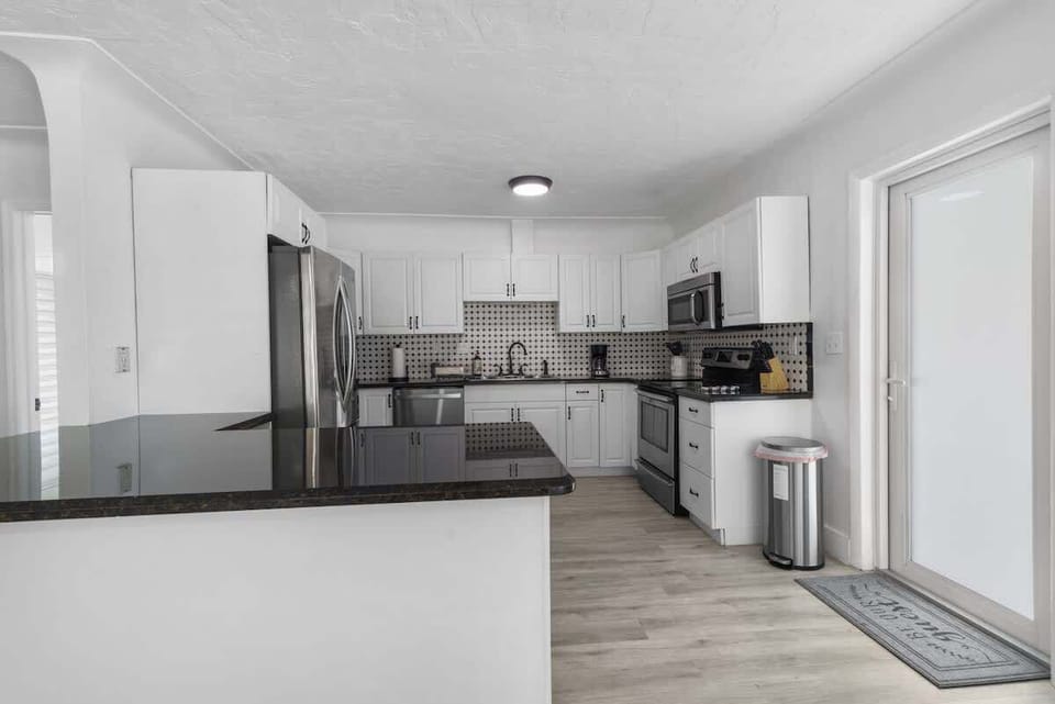 Fully stocked kitchen with modern appliances and everything you need to cook your favorite meals.