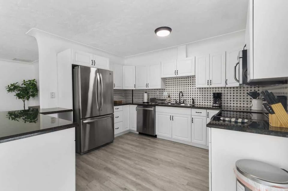 Fully stocked kitchen with modern appliances and everything you need to cook your favorite meals.