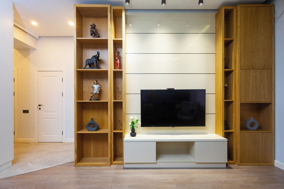 Comfort Apartment | Living area | 50-inch flat-screen TV with cable channels