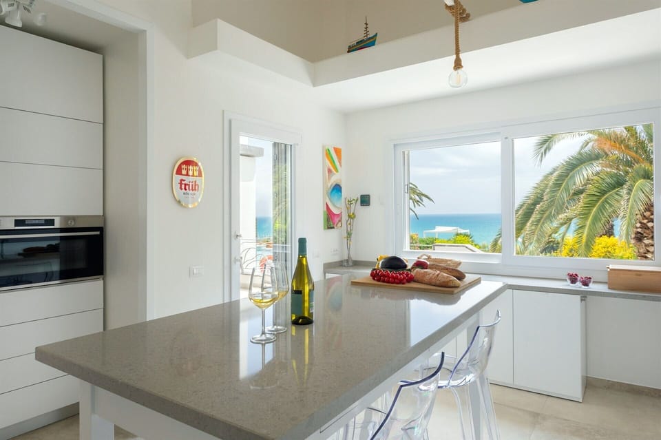 The bright, well-equipped kitchen also boasts stunning views.