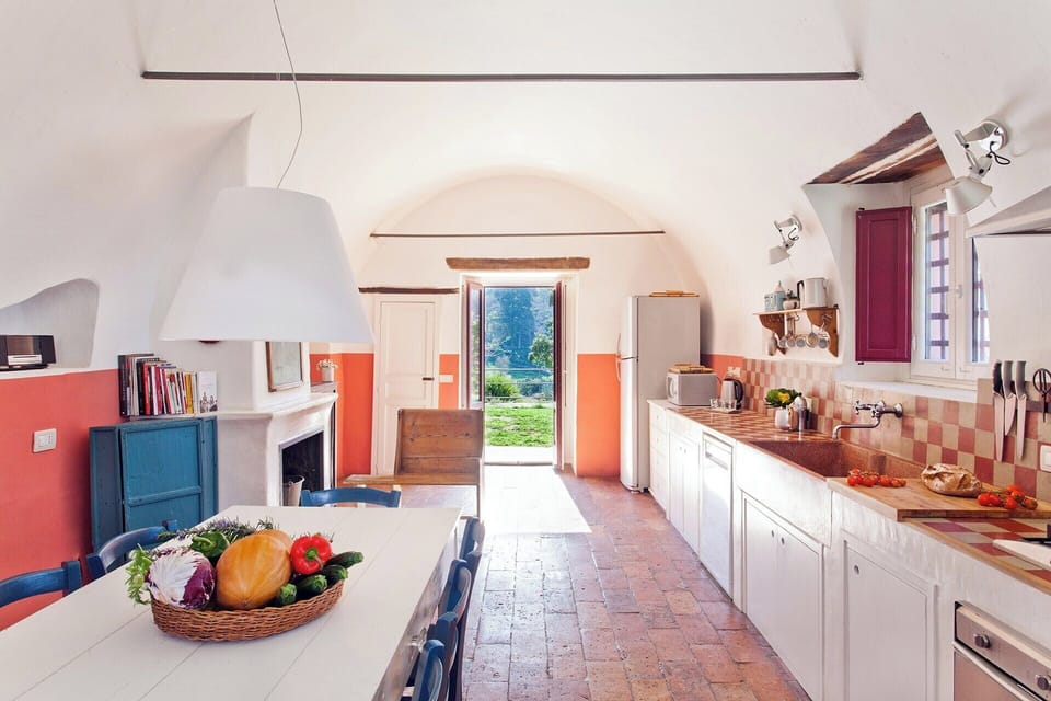 The large, well-equipped country kitchen.