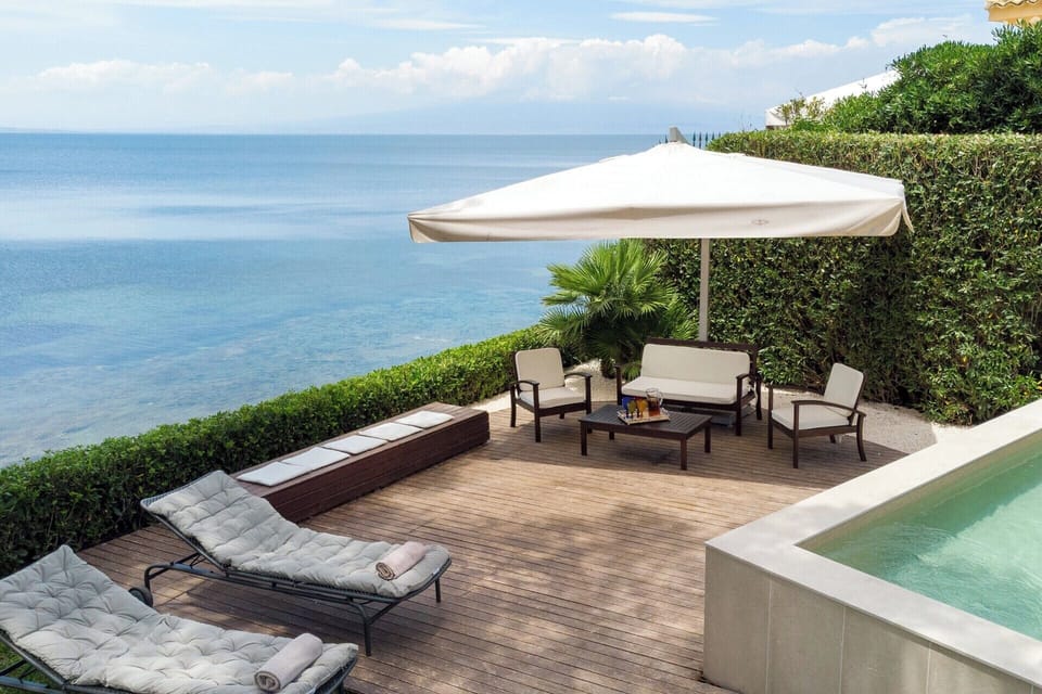 The pool and grounds overlook a sheltered bay.