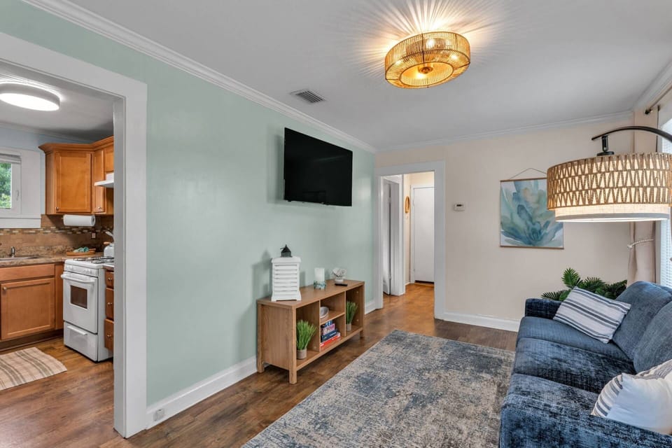 Cozy living space with seamless kitchen access — perfect for home-cooked meals and cozy nights in