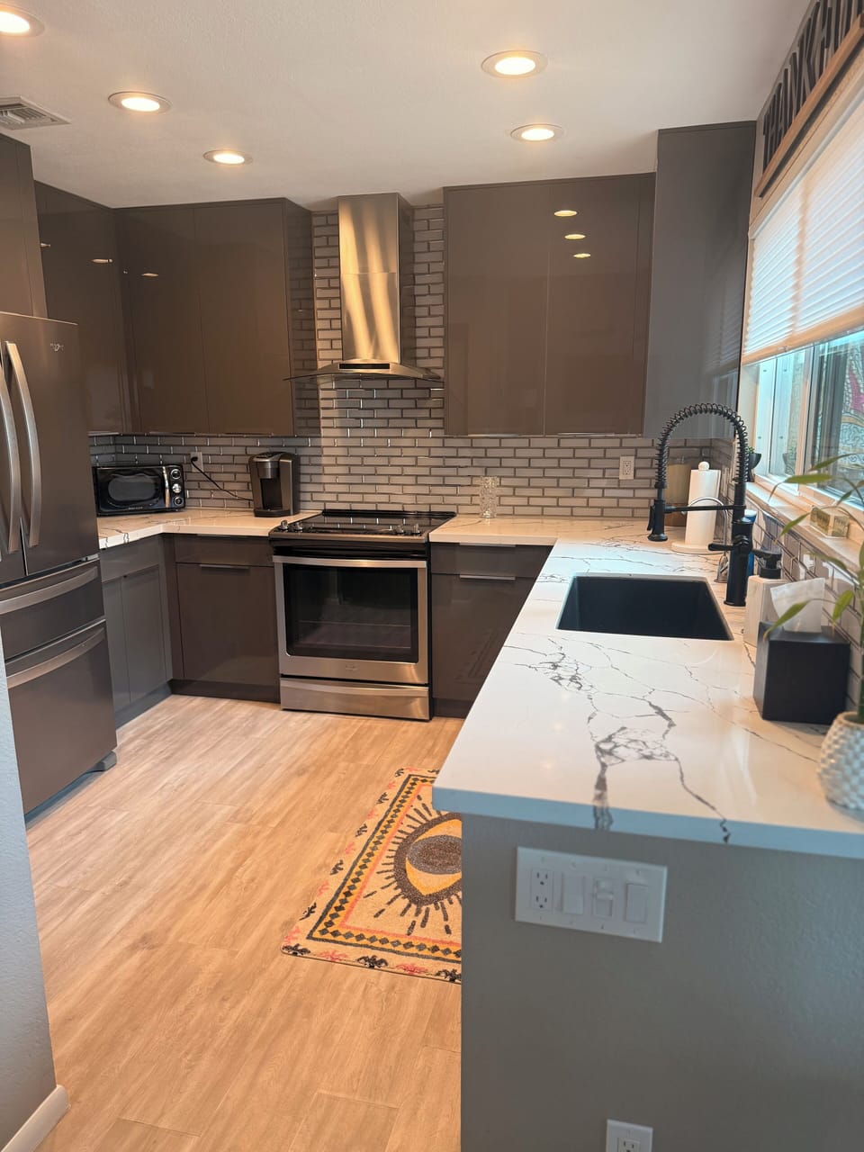 New High Gloss Cabinets and Quartz Countertops