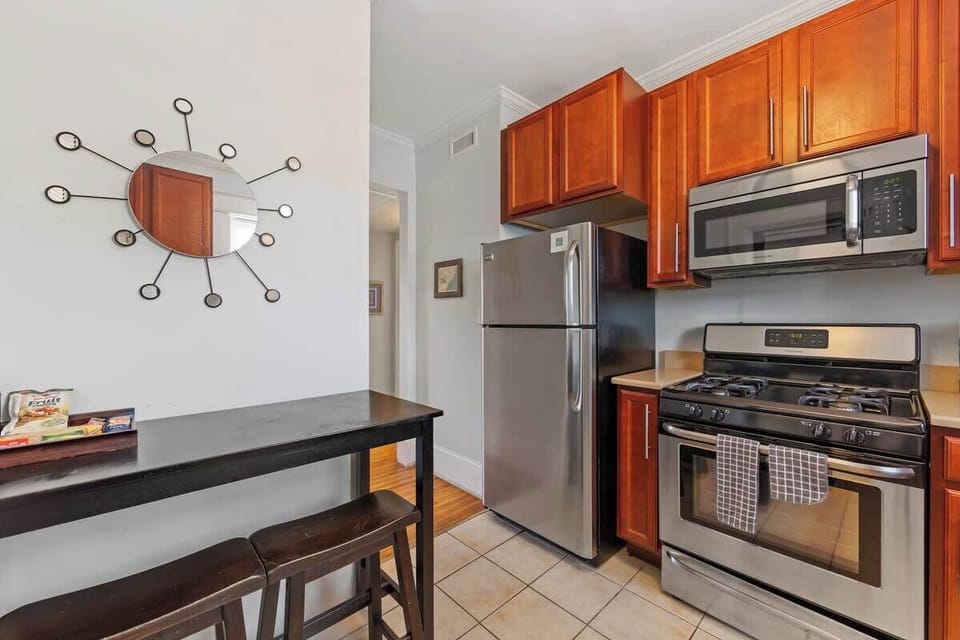 This inviting kitchen features a clean layout and everything needed to prepare meals at home.