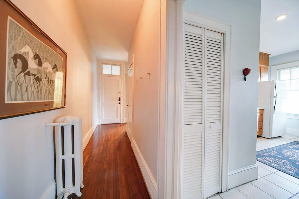 The bright, neutral tones create a calming atmosphere as you move through the home.