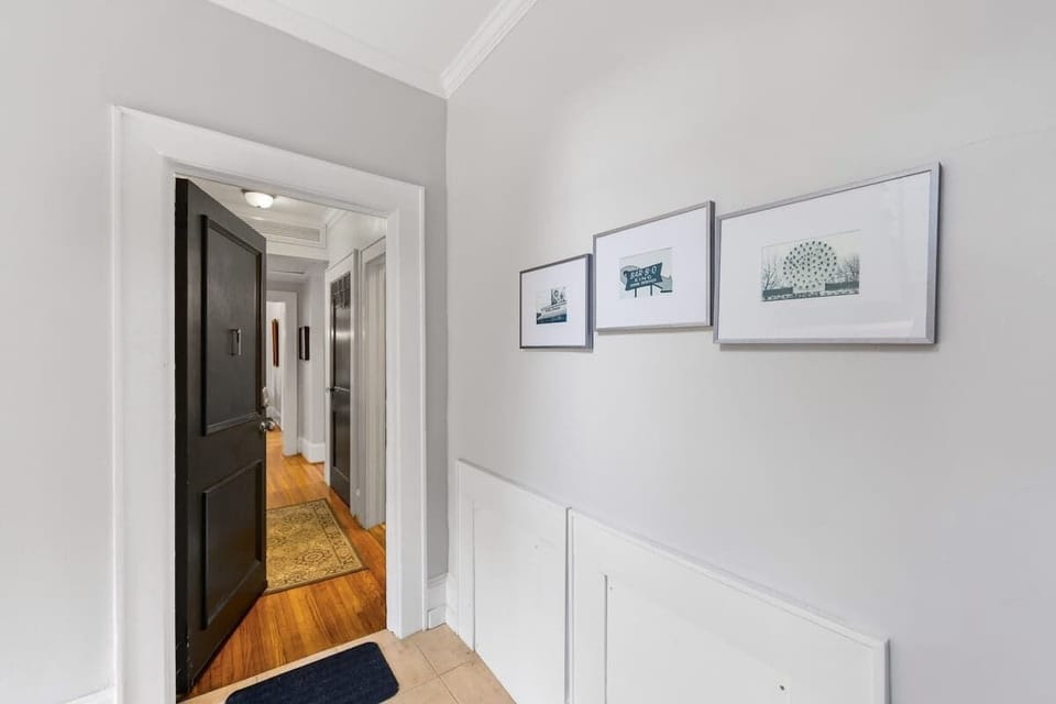 Step into a clean and welcoming entrance that leads into the home’s bright interior. Simple decor and warm tones create a pleasant first impression.