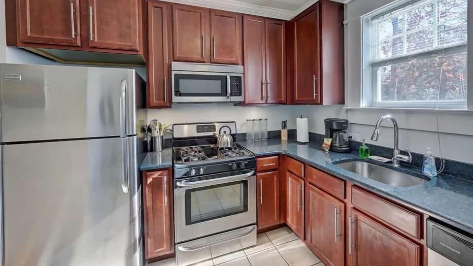 This well equipped kitchen features modern appliances, generous counter space, and everything needed for easy meal prep. Bright and functional, it makes cooking feel simple and comfortable.