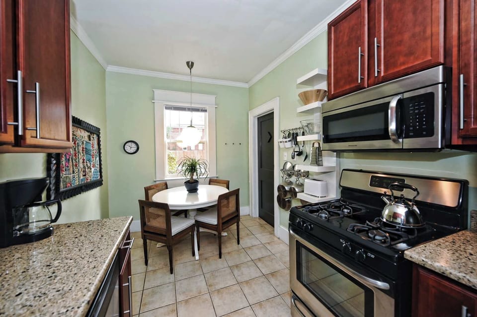 A comfortable spot for quiet mornings or casual dinners.