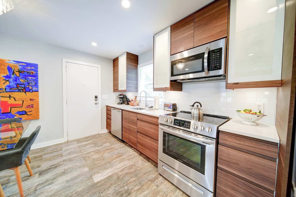 A fully equipped kitchen featuring modern appliances and all the essentials needed to whip up a gourmet meal.