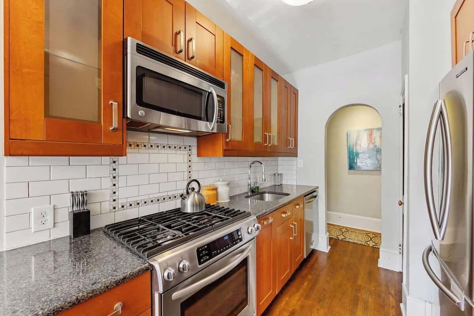 Fully equipped kitchen with modern appliances and everything needed for daily meals.