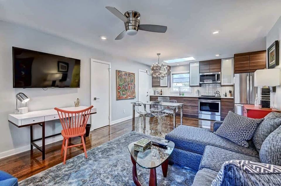 Every detail, from the textured rug to the designer lighting, is curated to make you feel right at home.