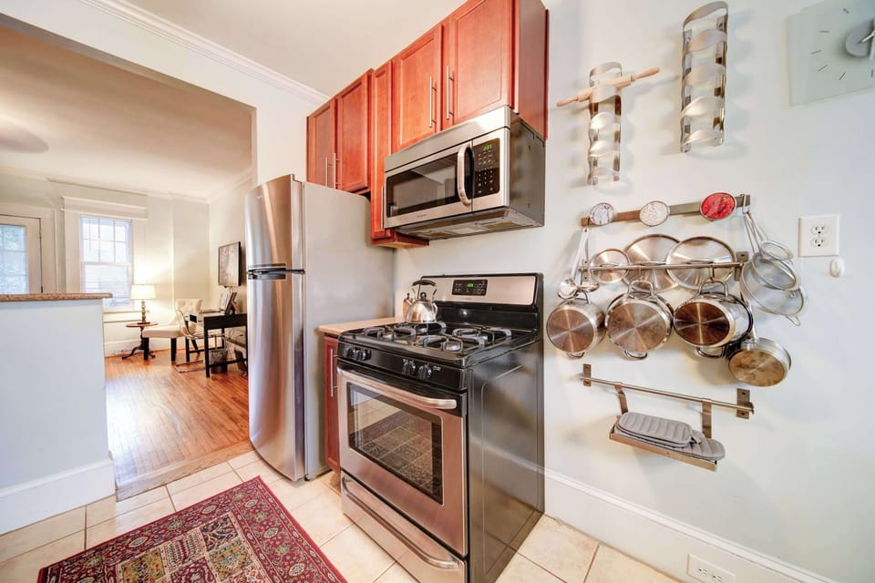Fully equipped kitchen with modern appliances and everything needed for daily meals.