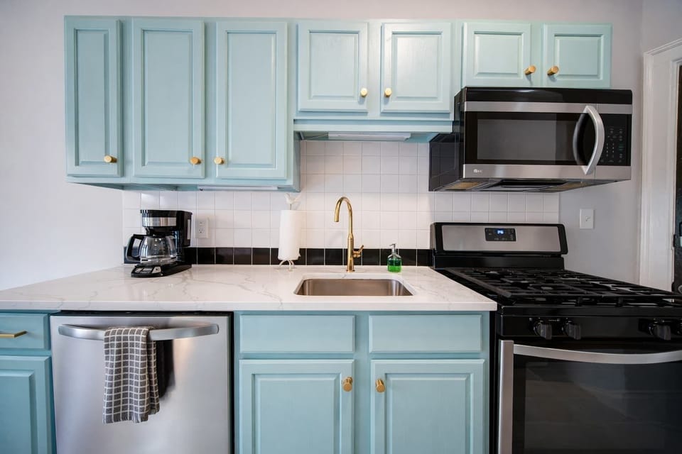 Functional kitchen with free parking and convenient access to nearby groceries.