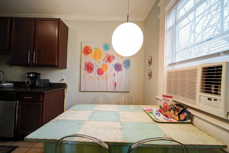Dining space perfect for meals, remote work, or enjoying coffee with free Wi-Fi.