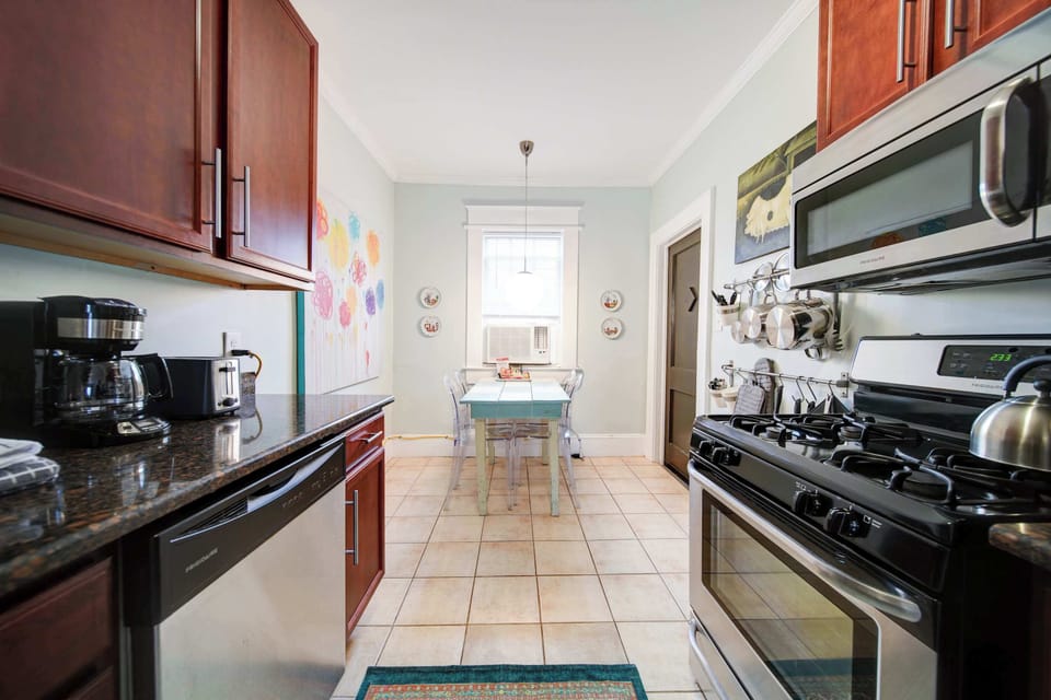 Fully equipped kitchen with modern appliances and everything needed for daily meals.